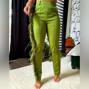 Green feather accent pants